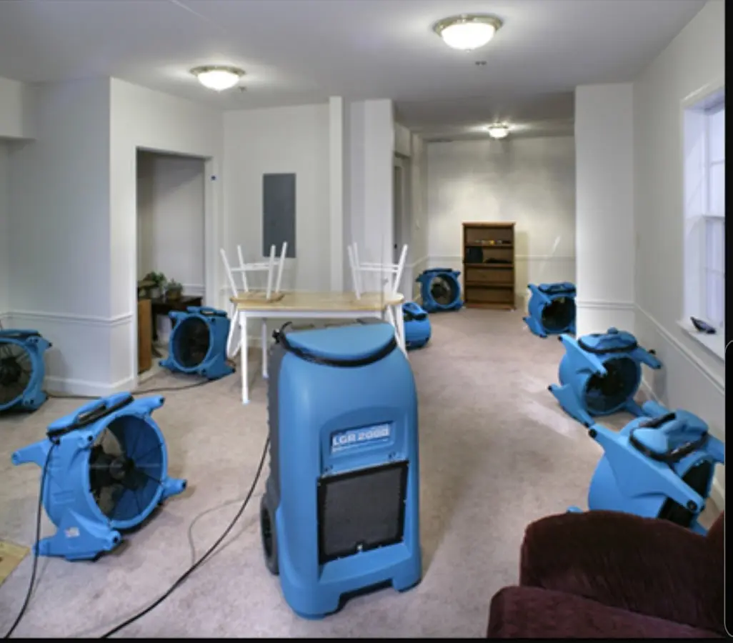 Air movers and dehumidifier setup for Water Extraction & Removal in McPherson